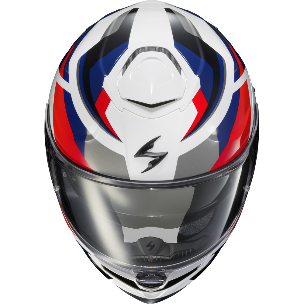 A full-face motorcycle helmet with a glossy white base and graphic accents in red, blue, and gray, featuring a clear visor.