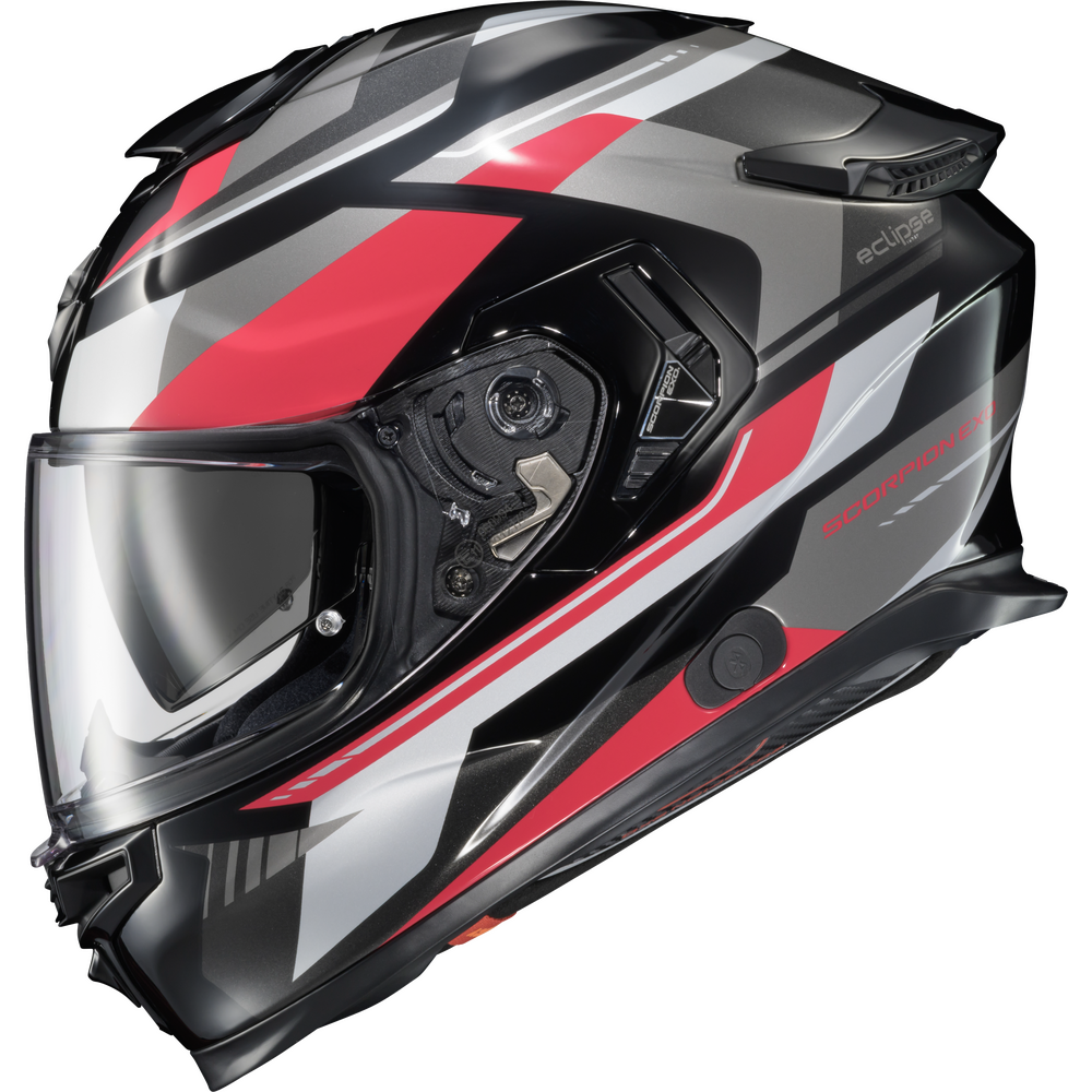 A full-face motorcycle helmet in a glossy black, gray, and red color scheme, featuring a clear visor and visible aerodynamic details, set against a plain white background.