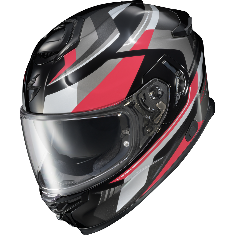 A full-face motorcycle helmet with a glossy black, silver, and red graphic design, featuring a clear visor.