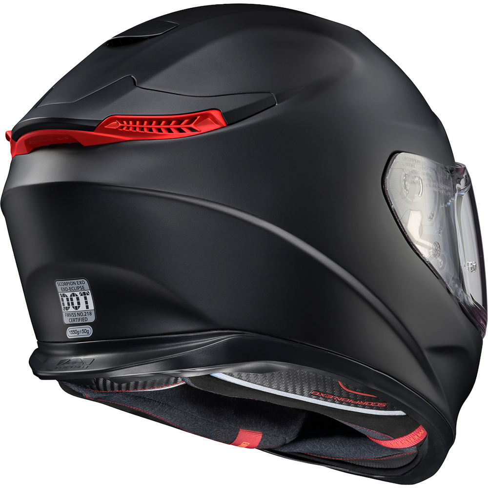 A matte black full-face motorcycle helmet with red accents on the visor area and interior padding, shown from a three-quarters rear angle against a white background.