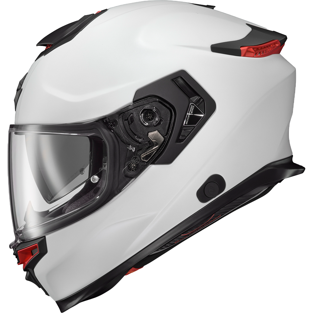 A white full-face motorcycle helmet with a clear visor, black chin bar and side accents, and small red details, shown on a plain white background.