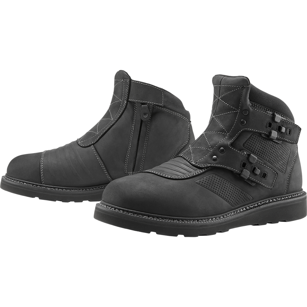 Pair of black high-top boots on a white background