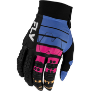 A single motocross or cycling glove shown against a plain white background. The glove features a color-blocked design with black, blue, and pink sections, along with textured black finger padding and a white 'FLY' logo on the back.