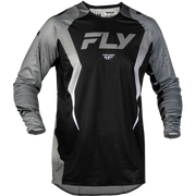 A long-sleeve motocross jersey in black and gray with white graphic accents, featuring the 'FLY' brand logo on the chest.