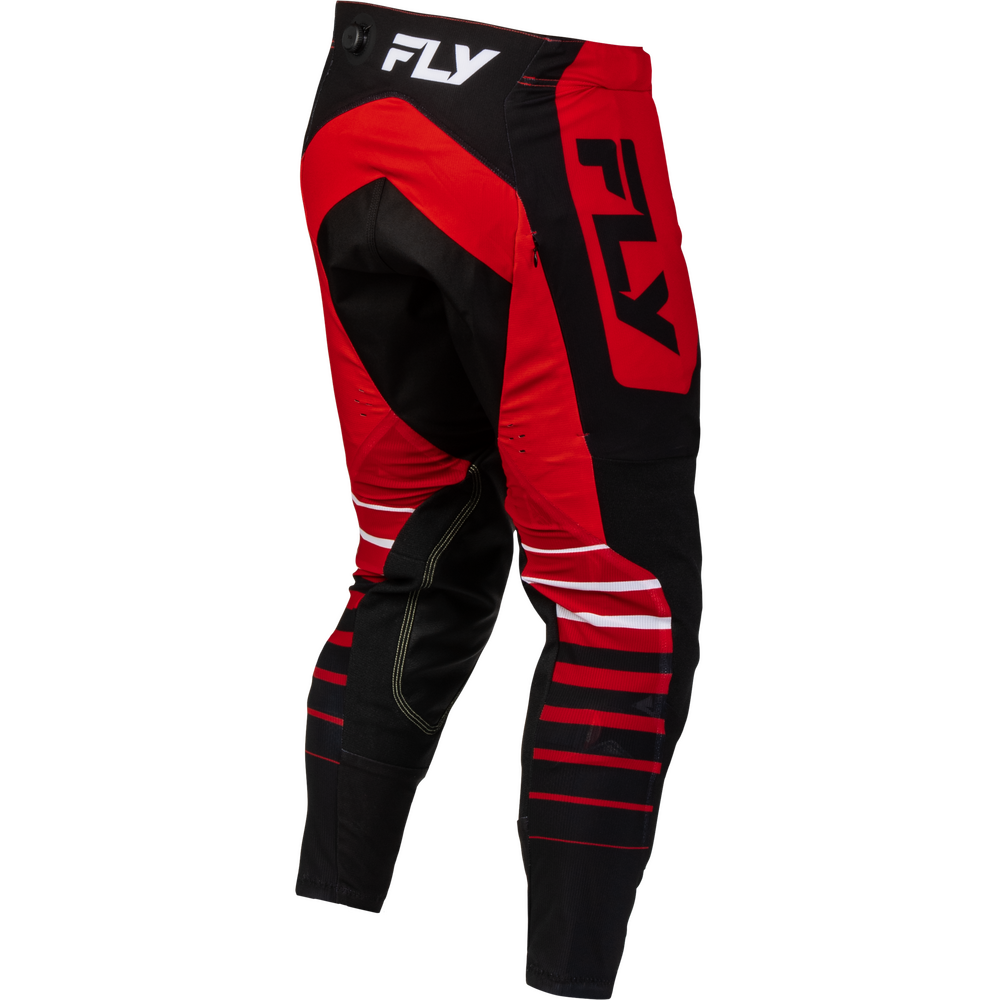 Red and black motocross pants with white and black FLY branding, shown from a three-quarters angle on a white background.