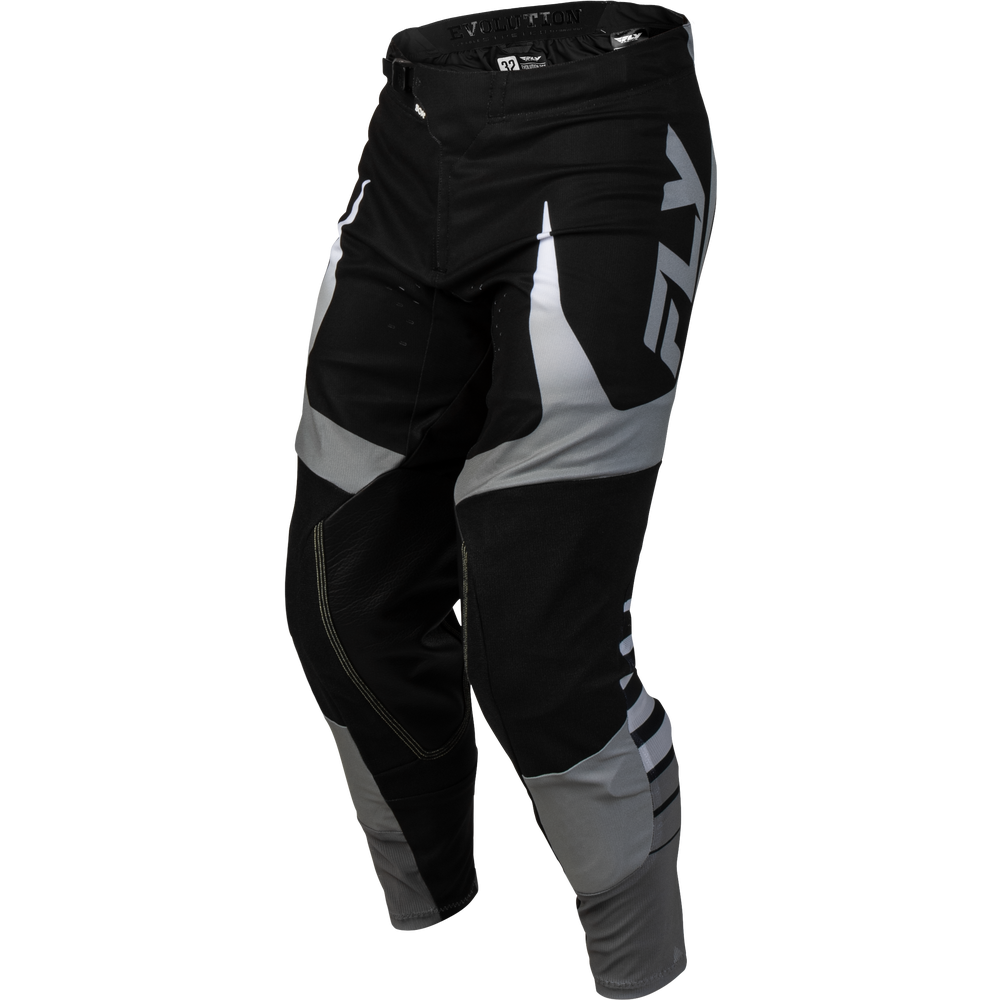 Black and gray Fly Racing motocross pants with a large white 'FLY' logo on the side, shown on a plain white background.