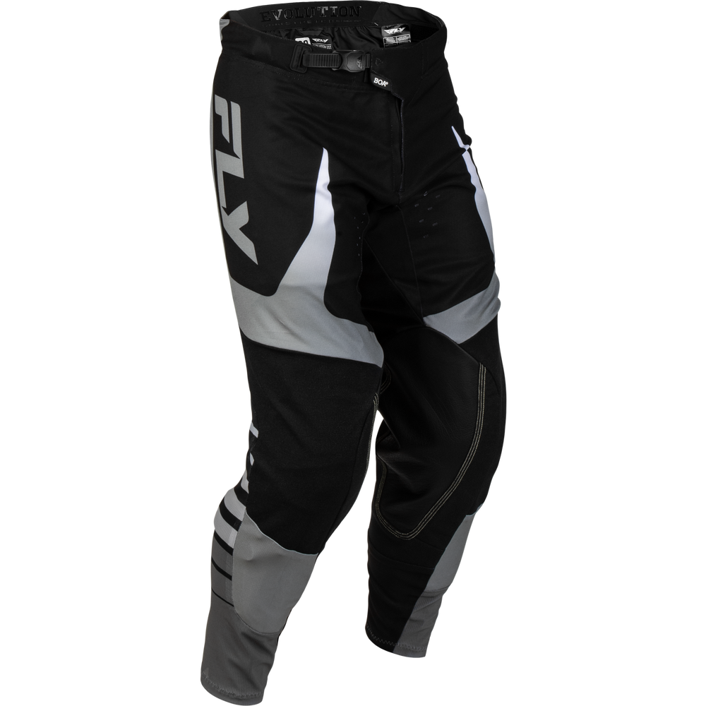 Black and gray motocross pants with a large white FXS logo on the left thigh, shown on a plain white background.