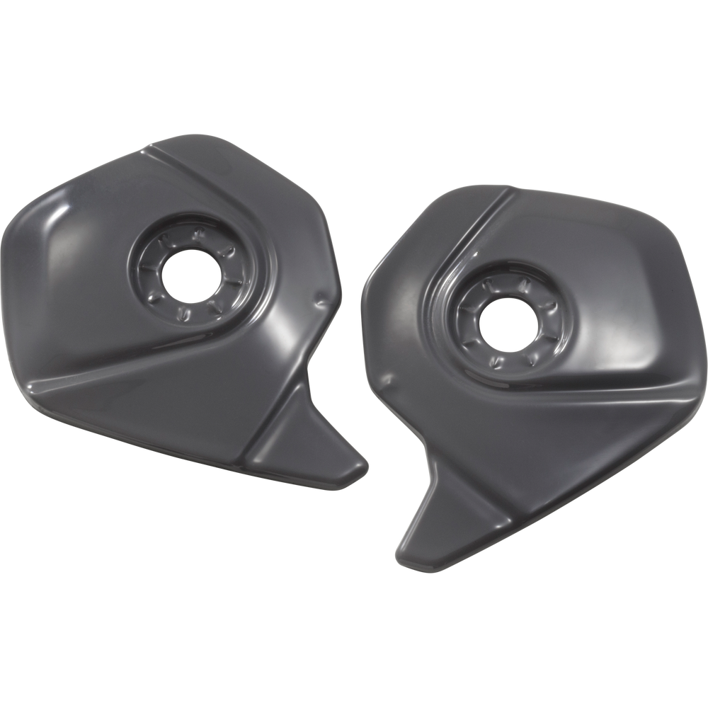 A pair of dark gray plastic motorcycle tank covers or fuel caps shown on a plain white background.
