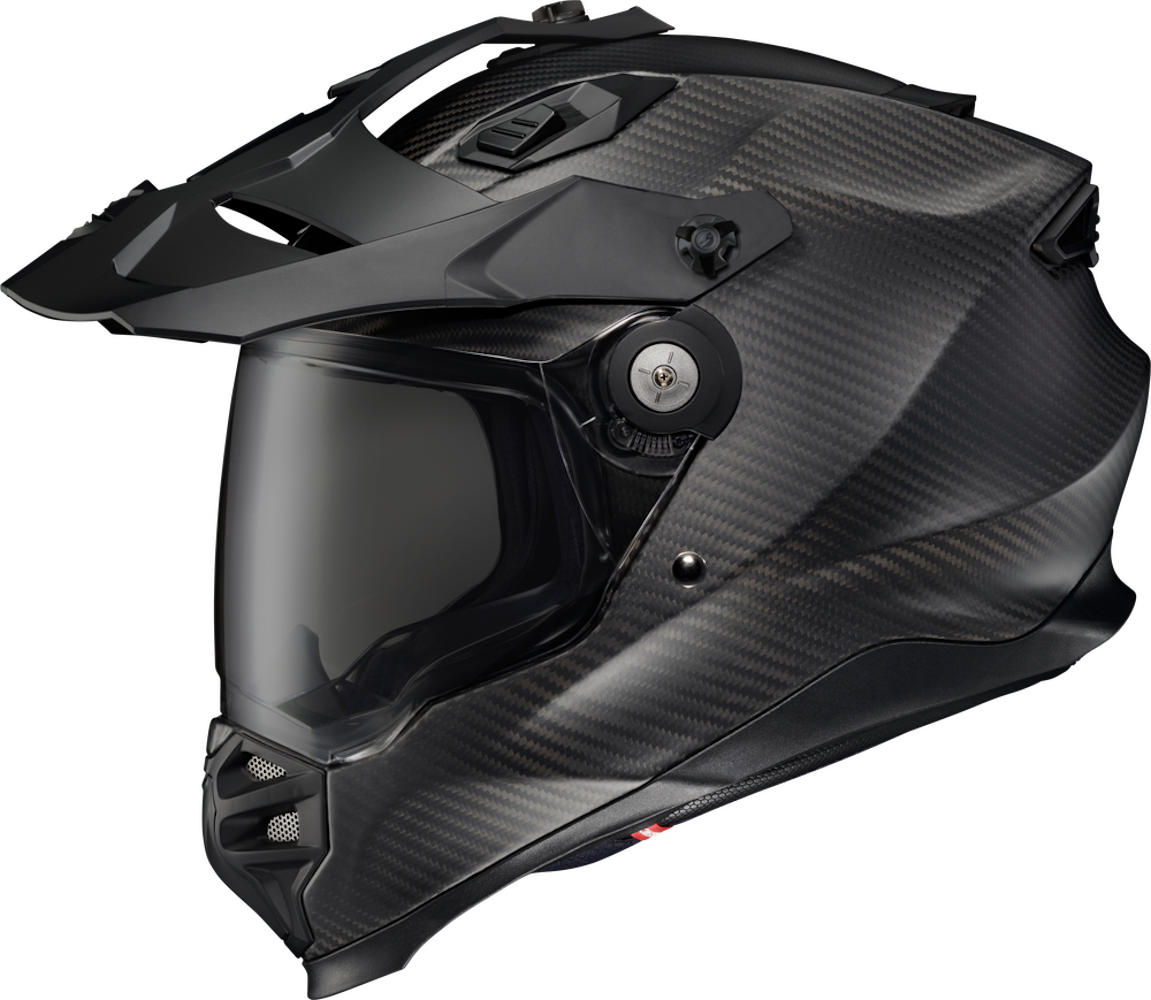 Carbon fiber motorcycle helmet on a black background