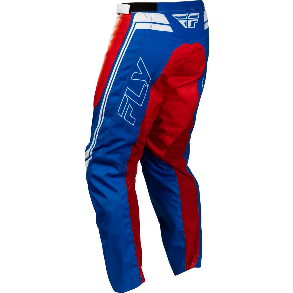 Blue and red Fly Racing motocross pants with white logo details, shown from a three-quarters angle on a white background.