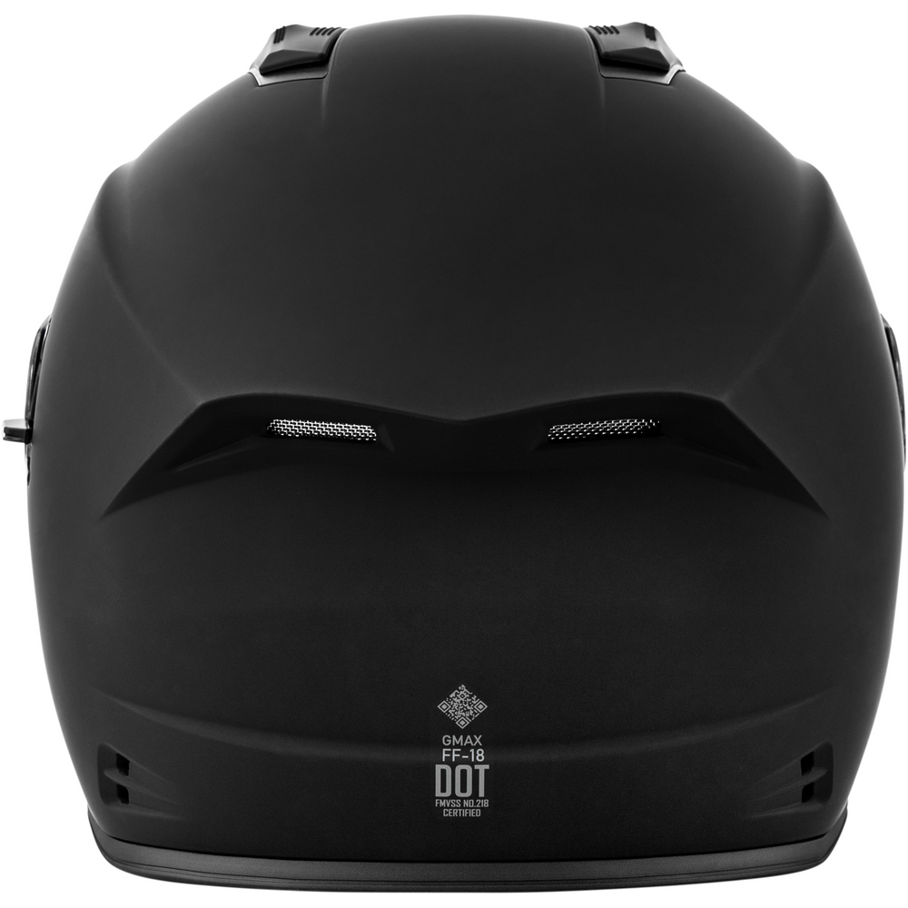 Black motorcycle helmet with GMAX logo on a white background
