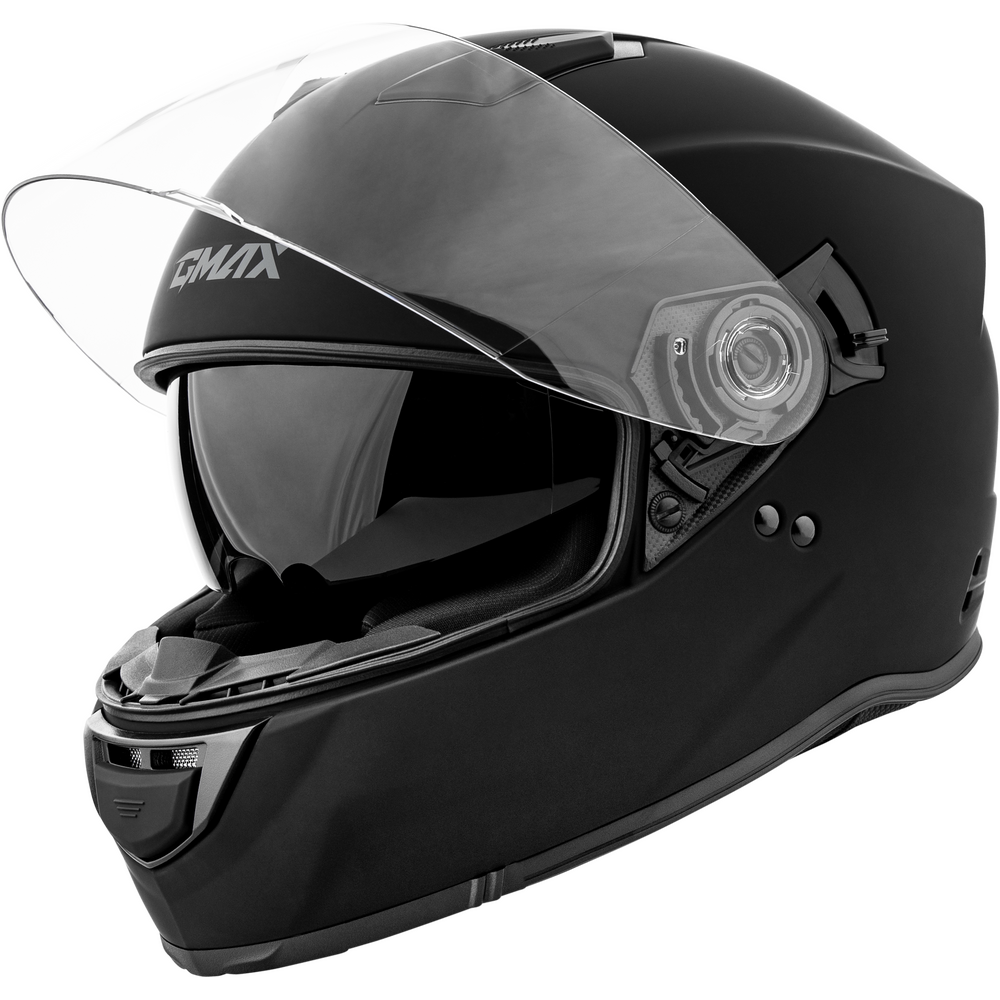 A matte black full-face motorcycle helmet with a clear visor, featuring the CMX logo on the forehead, shown against a plain white background.