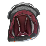 Helmet interior with red lining and black and gray exterior on a white background