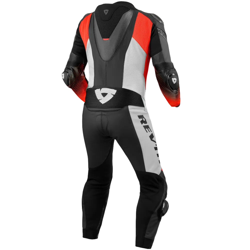 A black, gray, and red motorcycle leather suit shown from the back, featuring protective armor inserts and the brand name 'REV'IT!' printed vertically on the side, set against a plain white background.