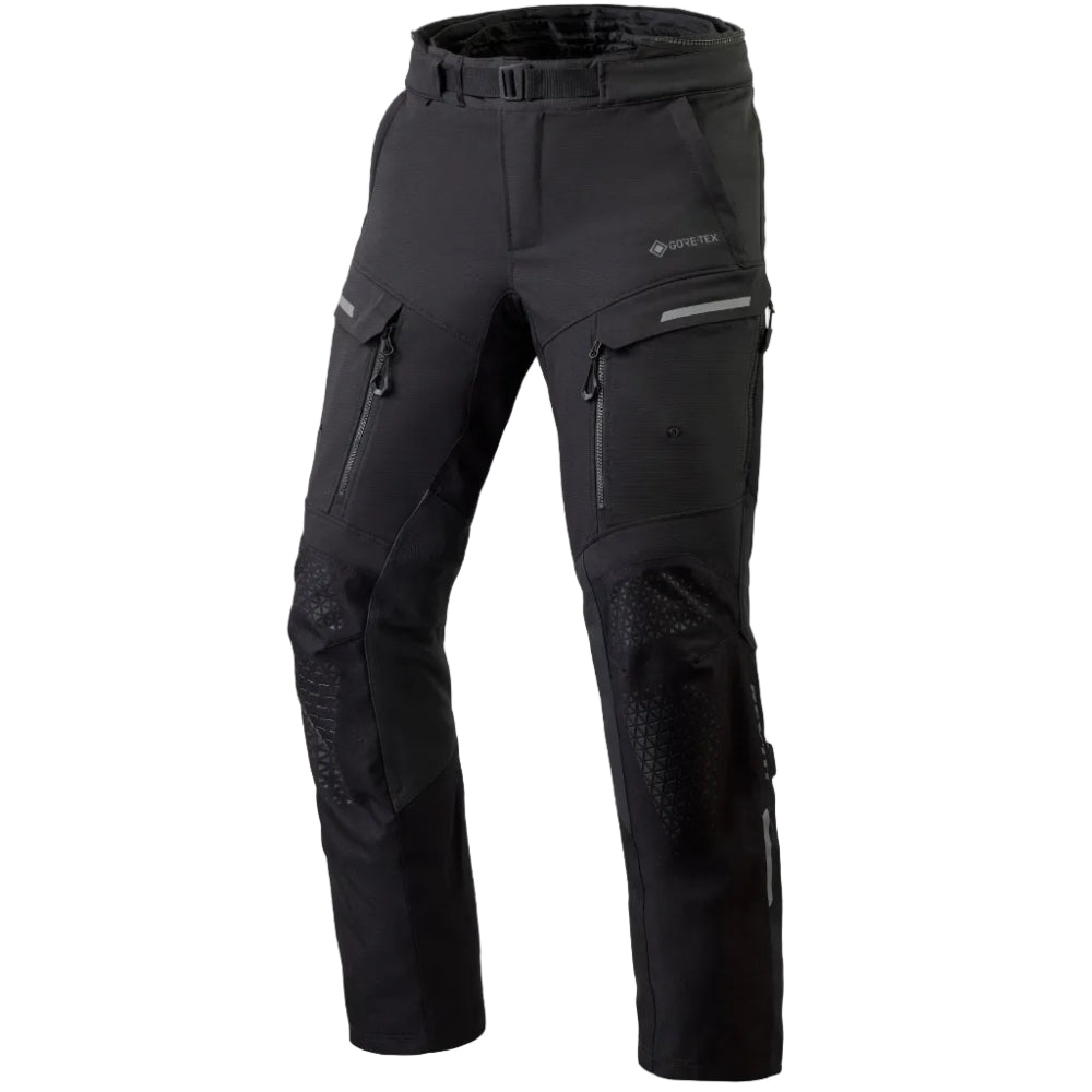 Black technical outdoor pants with multiple zippered pockets, reinforced knee panels, and a belt loop, shown on a plain white background.