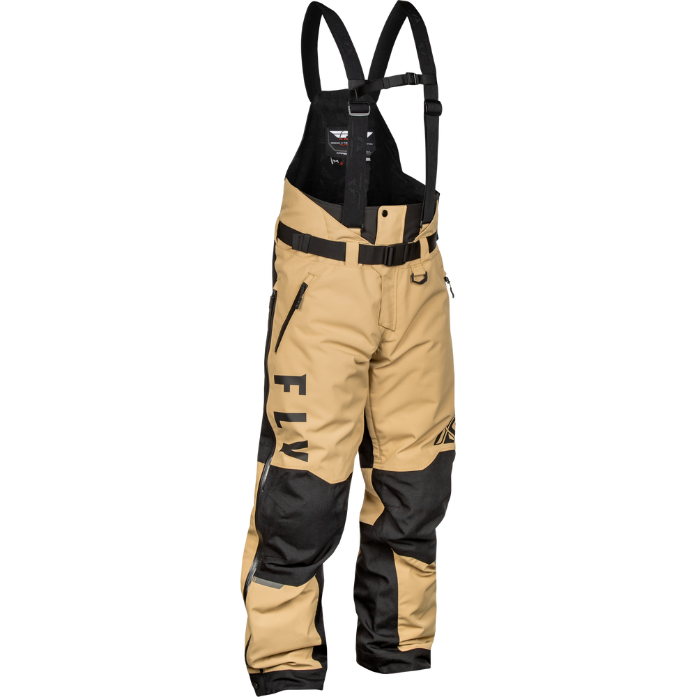 Tan and black Fly Racing bib pants with adjustable shoulder straps, a waist belt, and vertical Fly branding on the left leg, shown against a plain white background.
