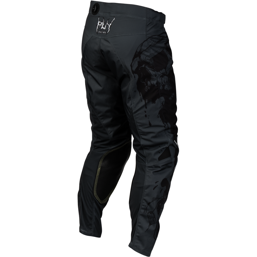 Black motocross pants with a dark abstract graphic print on the right leg, featuring a white 'FLY' logo on the upper left hip, shown from a three-quarters angle on a white background.