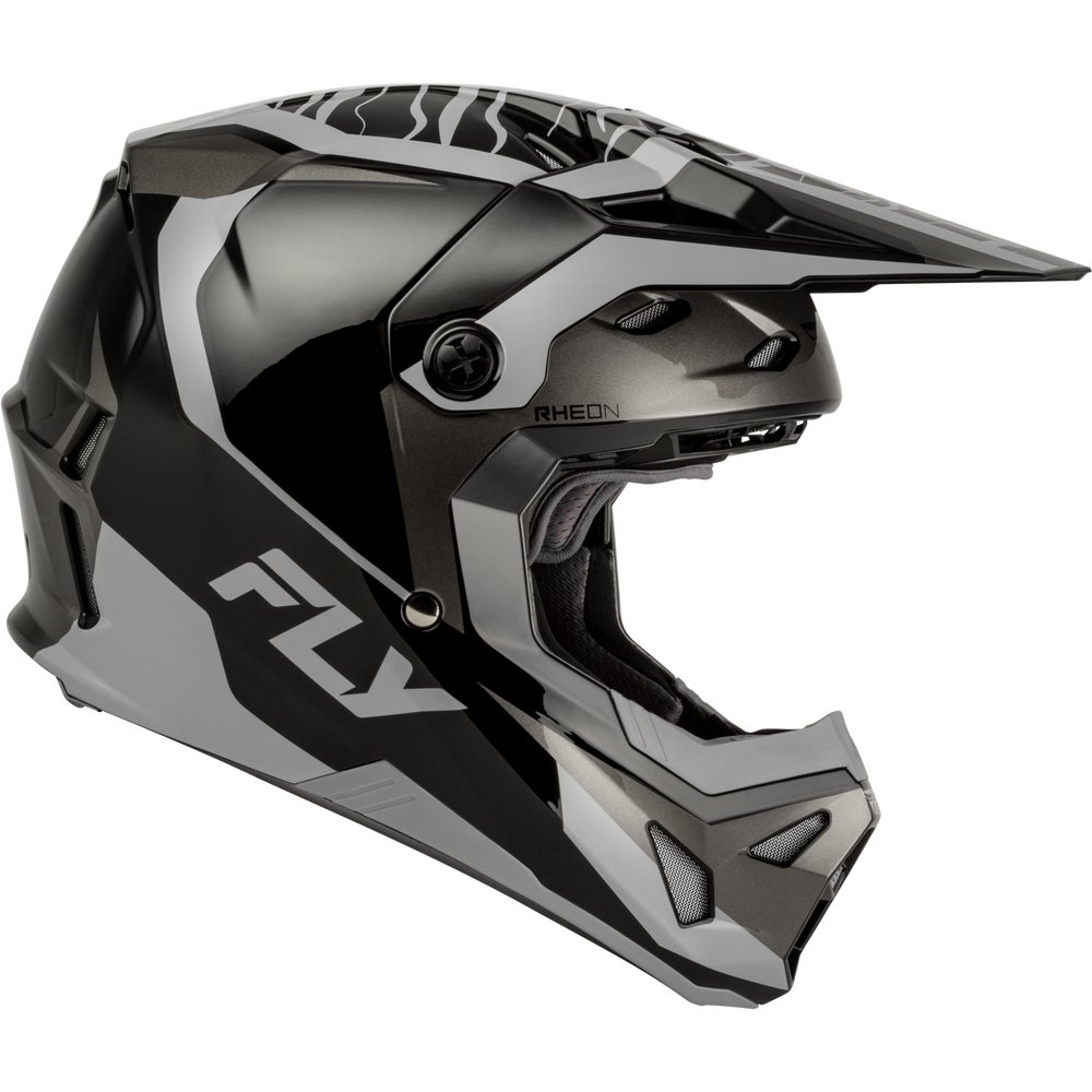 A full-face motocross helmet in a glossy black and dark gray color scheme, featuring a prominent visor and the 'FLY' brand logo on the side, set against a plain white background.