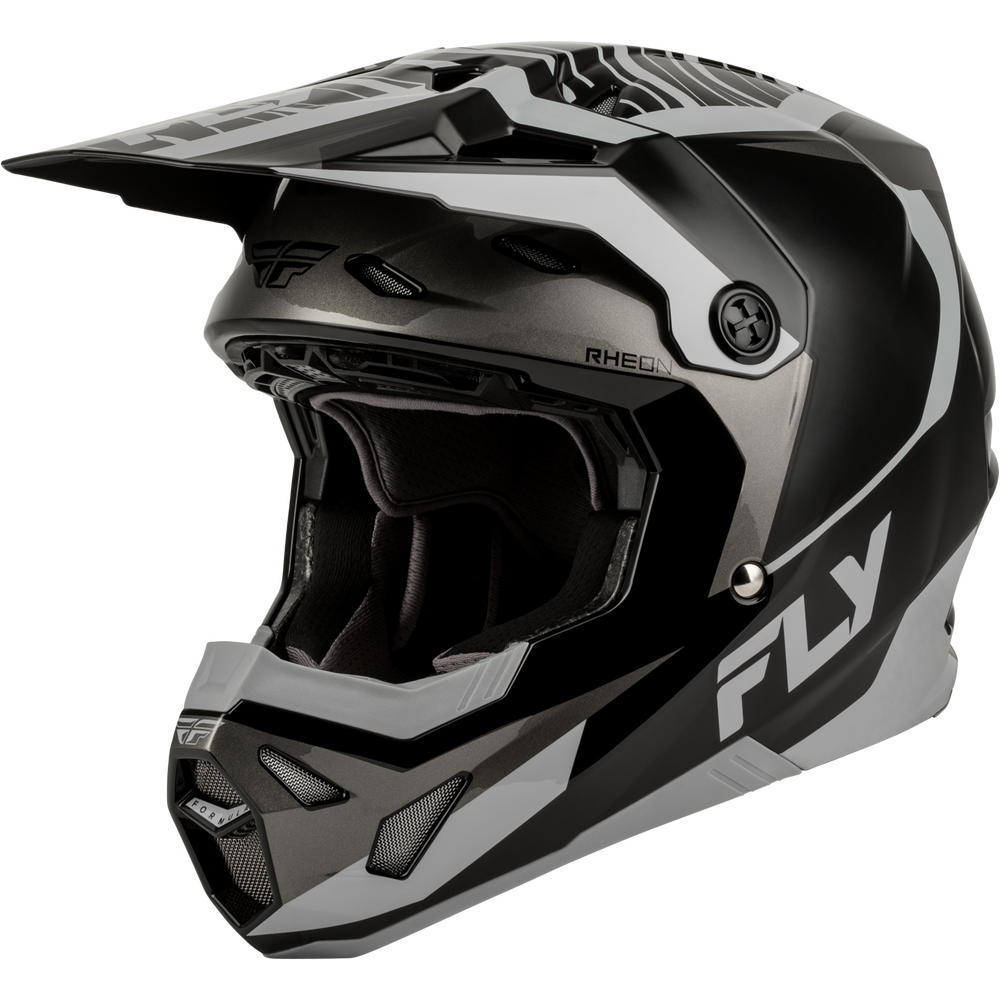 A full-face motocross helmet in black and gray with white graphic accents, featuring a visor and the FLY brand logo on the side and chin guard, set against a plain white background.