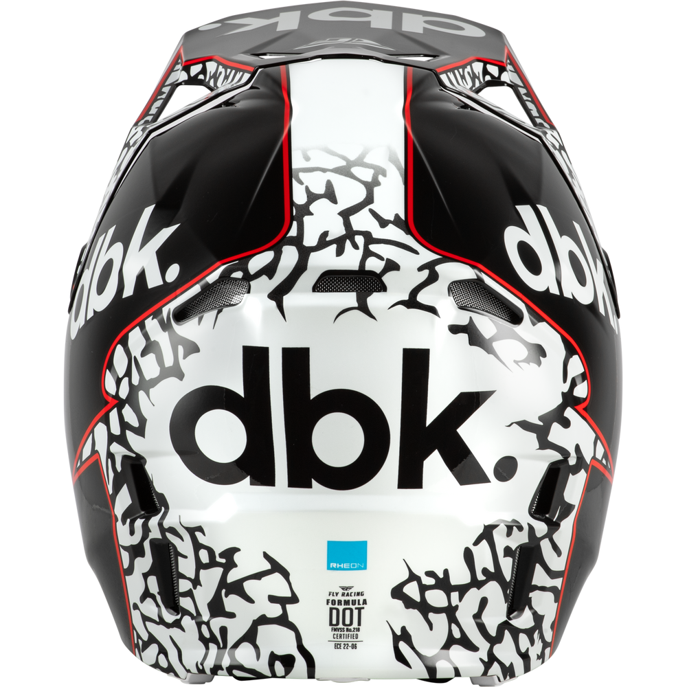 A close-up of a motorcycle helmet featuring a white and black graphic pattern with red accents and the prominent 'dbk.' logo on the front.
