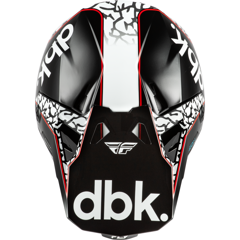 A close-up of a black, white, and red off-road motorcycle helmet with 'dbk.' branding on the front and side panels, set against a plain white background.