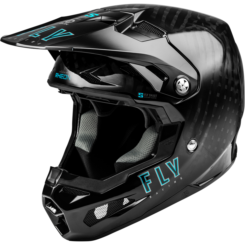 A black full-face motocross helmet with a subtle carbon fiber pattern, featuring bright teal 'FLY Racing' branding on the visor and lower shell, shown against a solid white background.