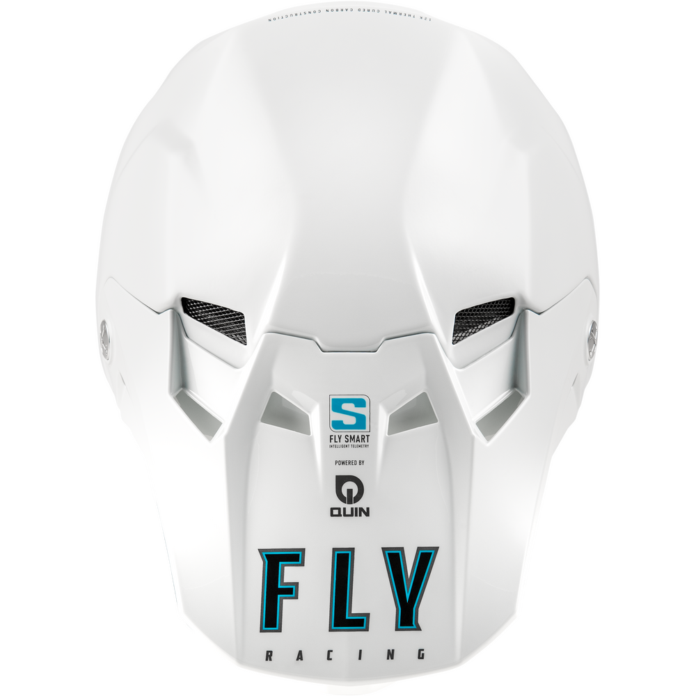 A white full-face motocross helmet with a matching white face shield, featuring black vent details and prominent 'FLY RACING' text in black and teal on the front.