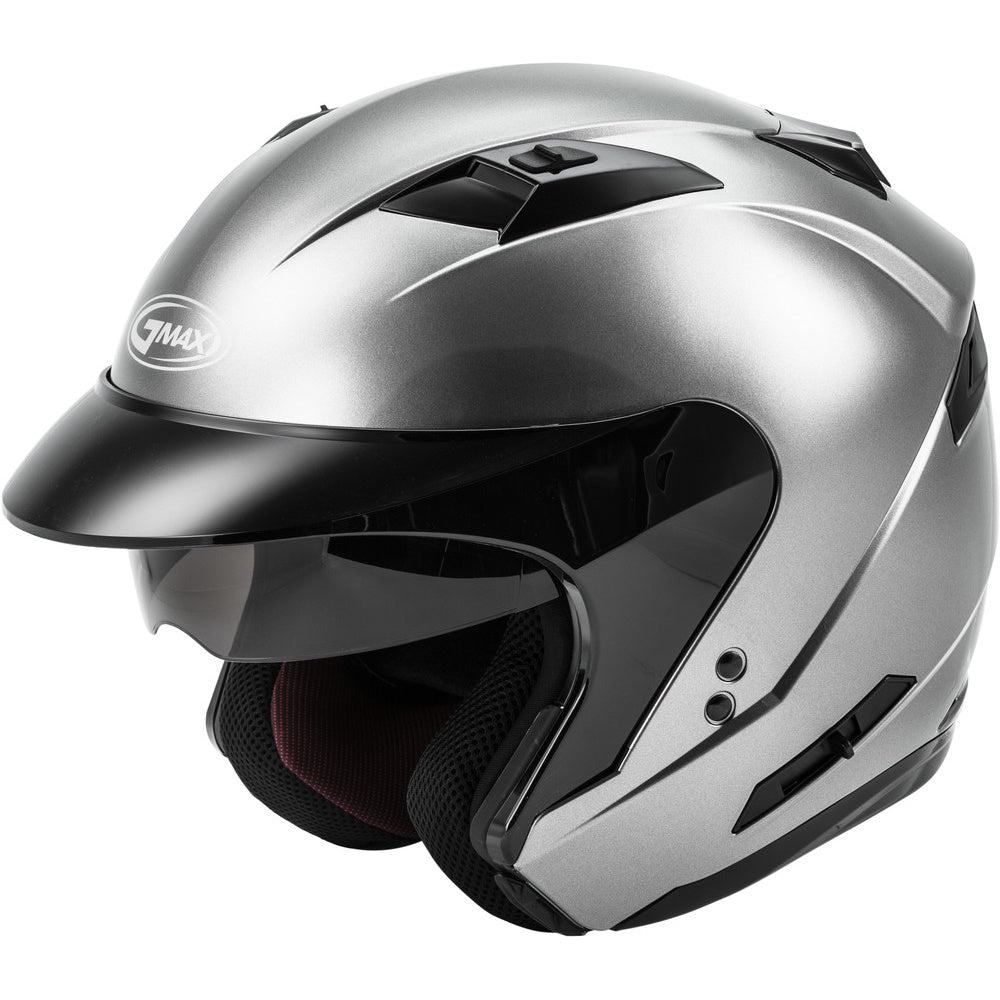 Silver motorcycle helmet with a black visor on a white background