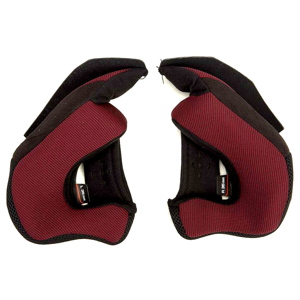 Pair of red and black protective shoulder pads on a white background