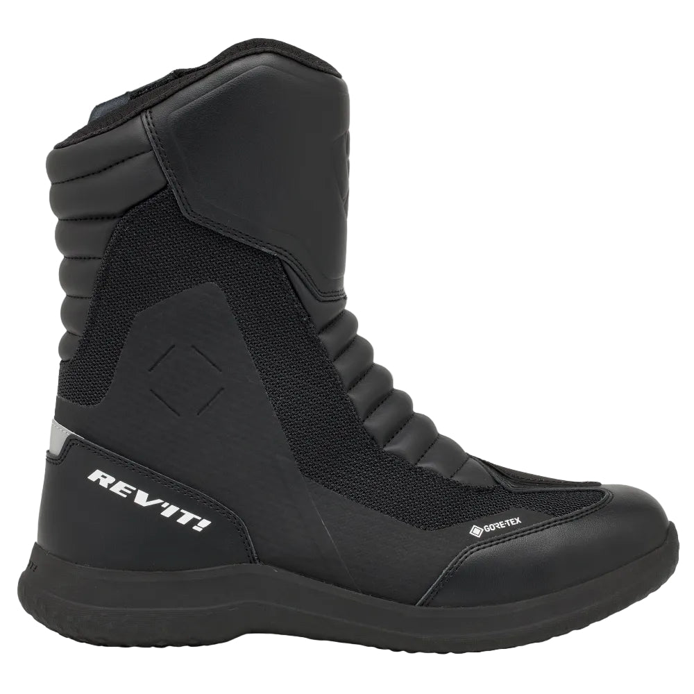 Black motorcycle boot with visible branding on a light gray background