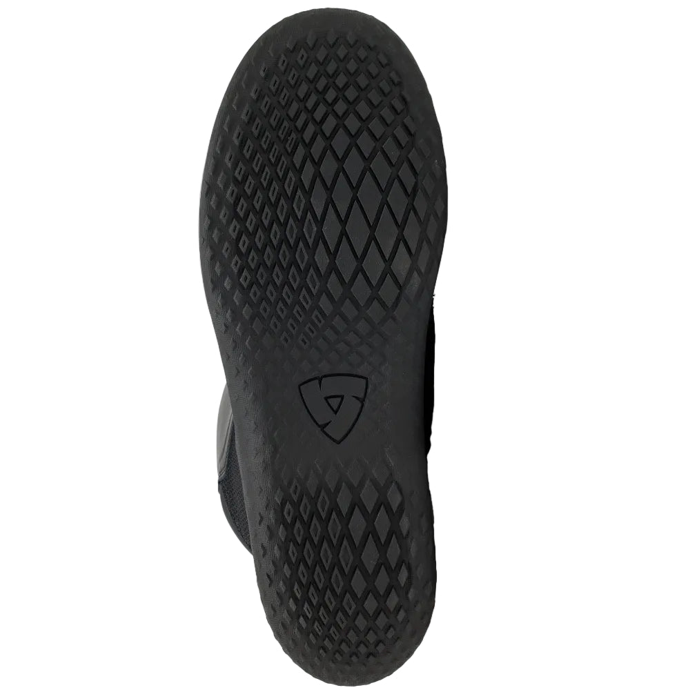 Black motorcycle boot with sole pattern on a white background