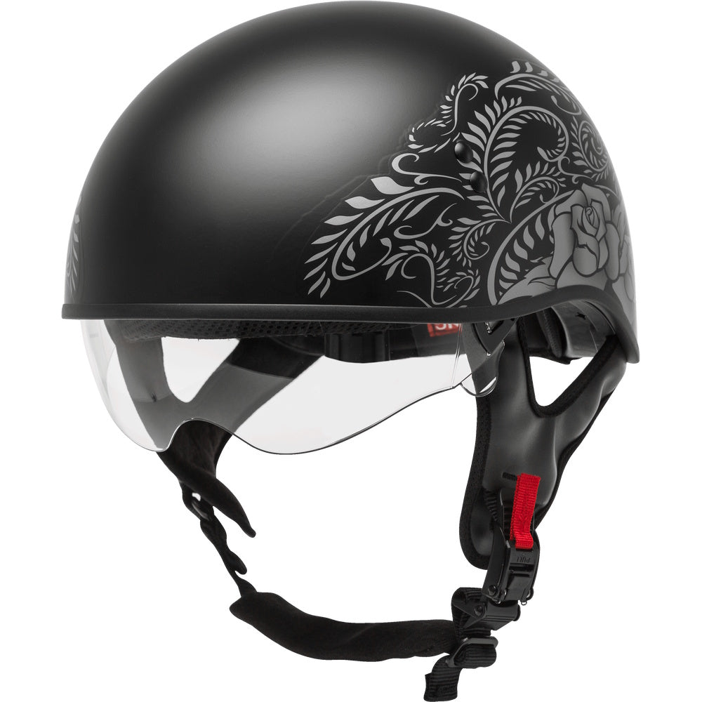Black motorcycle helmet with decorative design on a clear background
