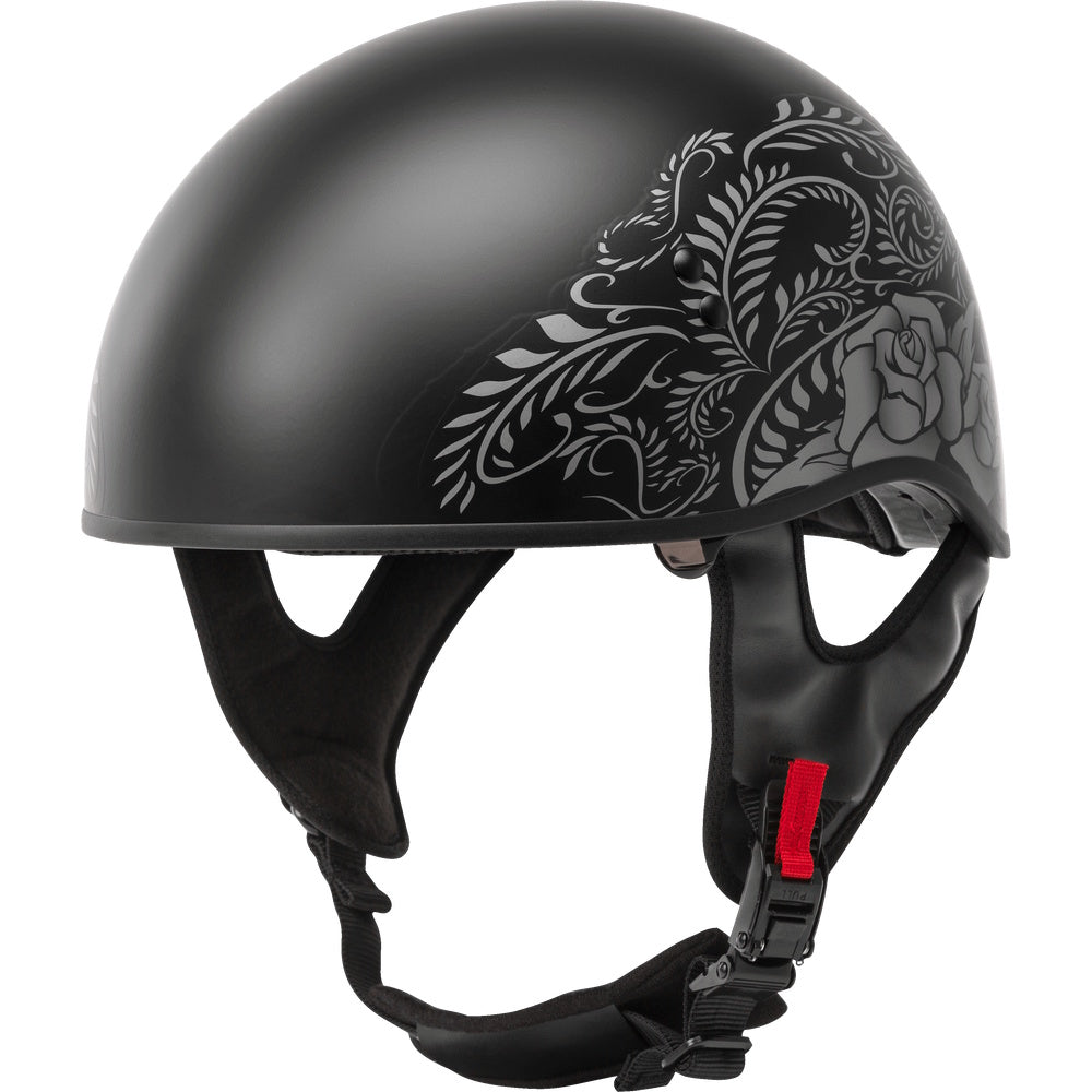 Black helmet with intricate white designs on a clear background