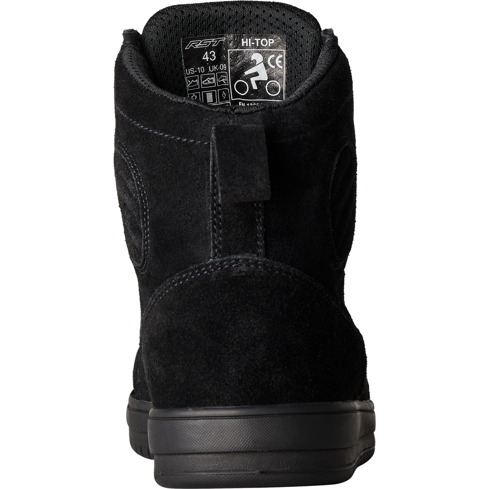 A black high-top snowboard boot shown from the back, featuring a suede-like finish, a pull tab, and a black sole on a white background.