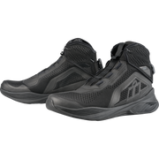 A pair of black high-top tactical boots with mesh panels and textured synthetic overlays, shown on a solid white background.