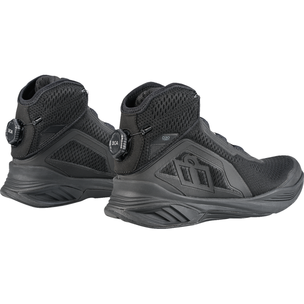 A pair of black high-top waterproof boots with dial-uppers, shown from a three-quarters angle on a white background.