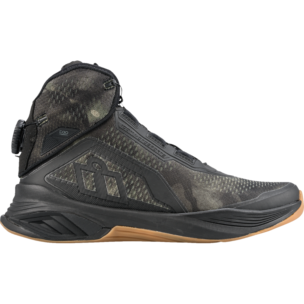 A high-top outdoor boot in black and dark gray camouflage with a brown outsole, shown from a side profile on a white background.