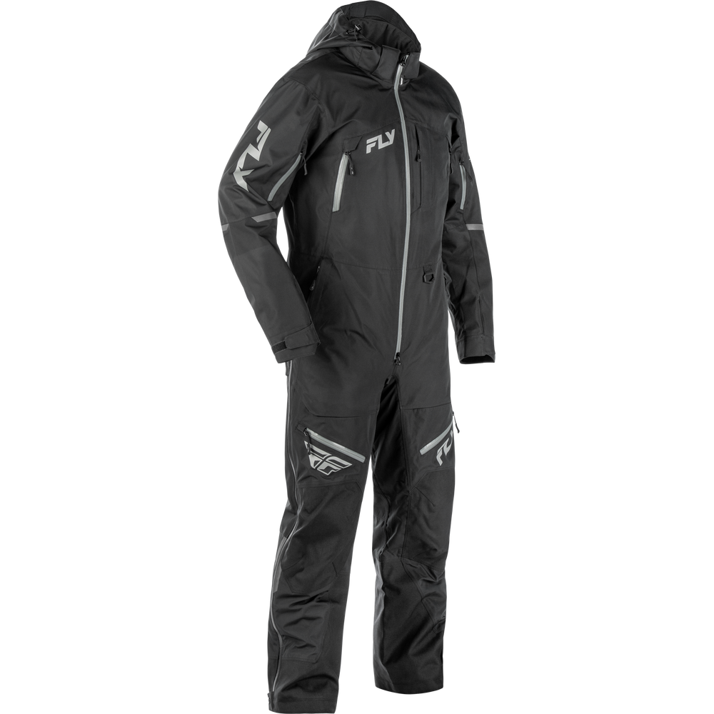 A black Fly Racing snowsuit with reflective gray details and white logo branding, shown on a plain white background.