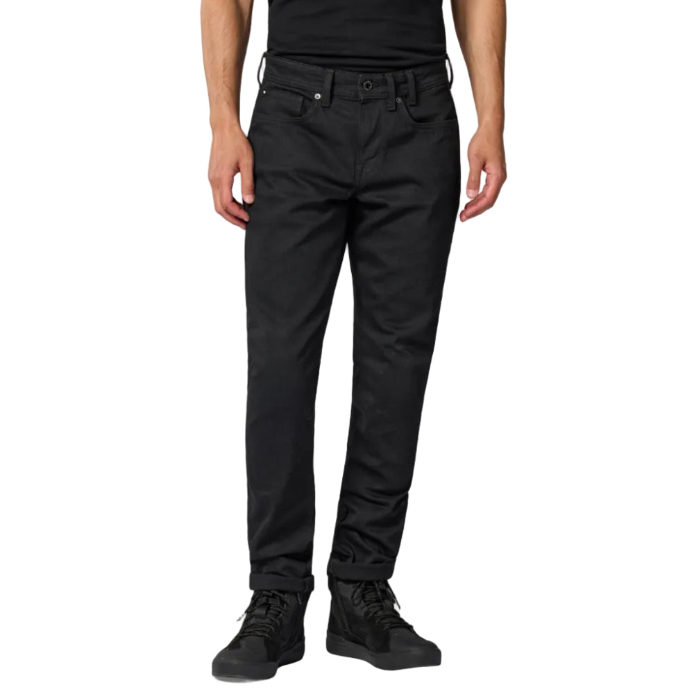 Person wearing black pants on a white background