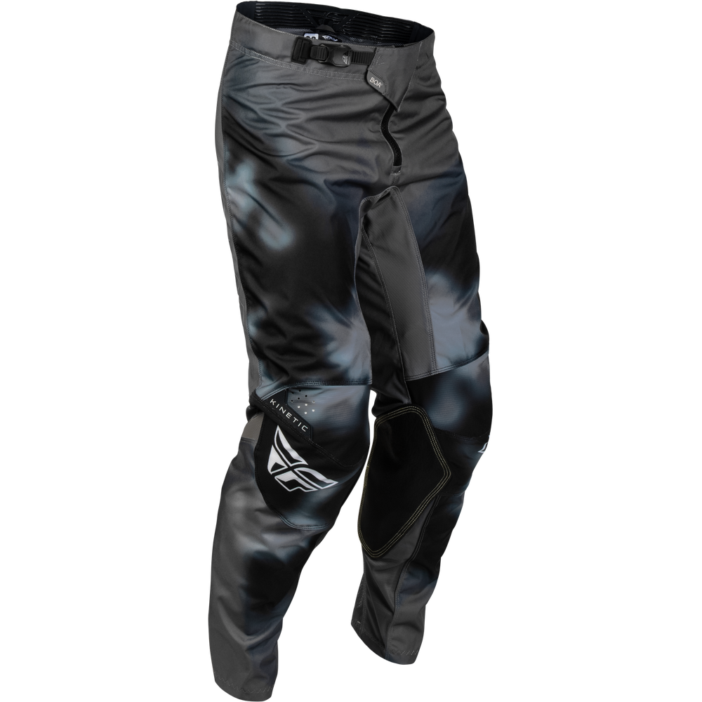 Black and gray motocross pants with a dark smoky camouflage pattern, featuring protective knee panels and a white wing logo on the lower left leg.