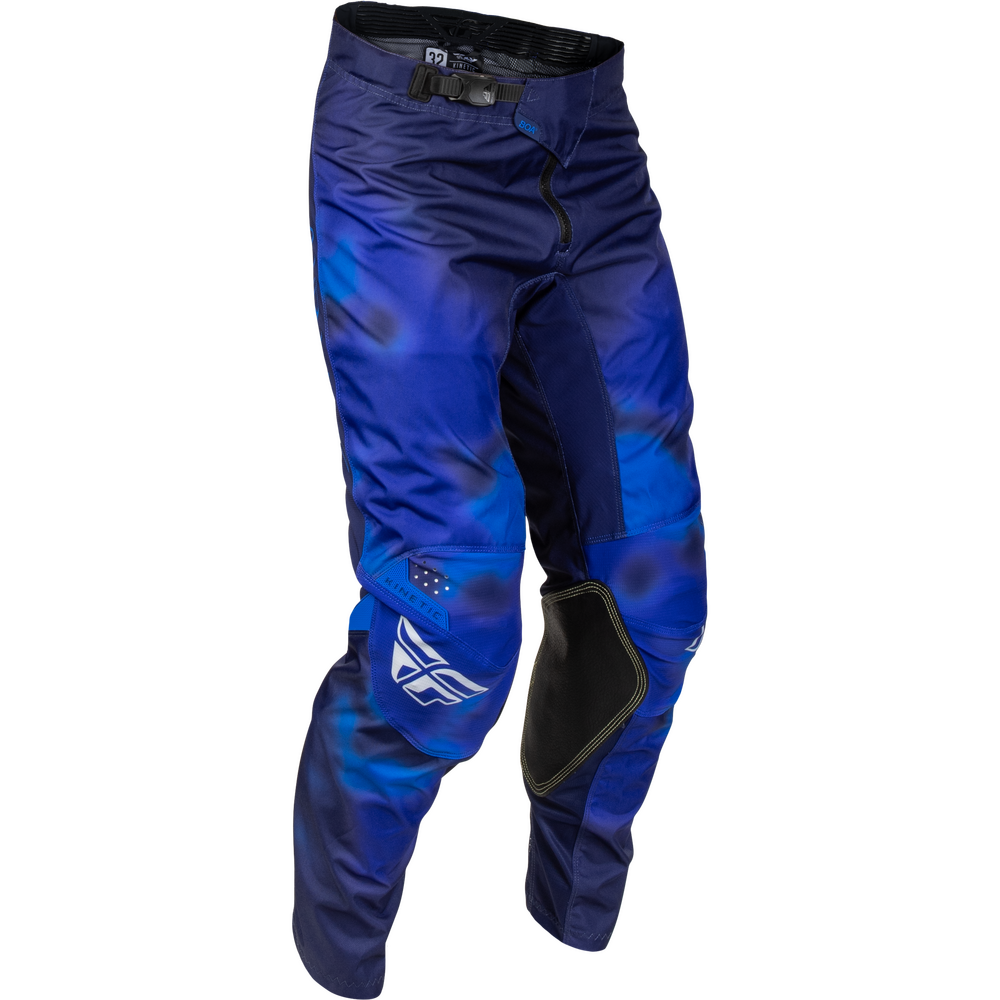Blue motocross pants with a blue and black abstract pattern, featuring a white wing logo on the lower left leg and black knee protection, shown on a plain white background.