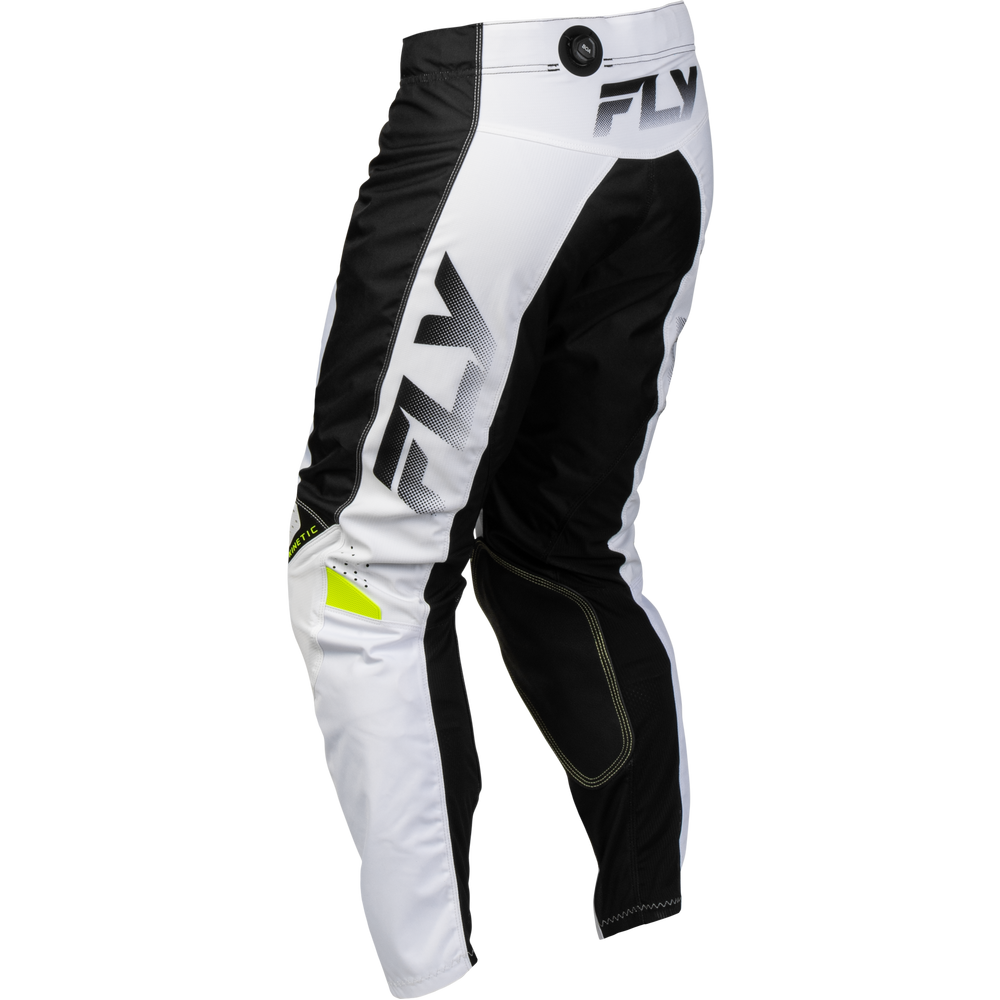 White and black Fly motocross pants with a small neon yellow accent on the lower left leg, shown against a plain white background.