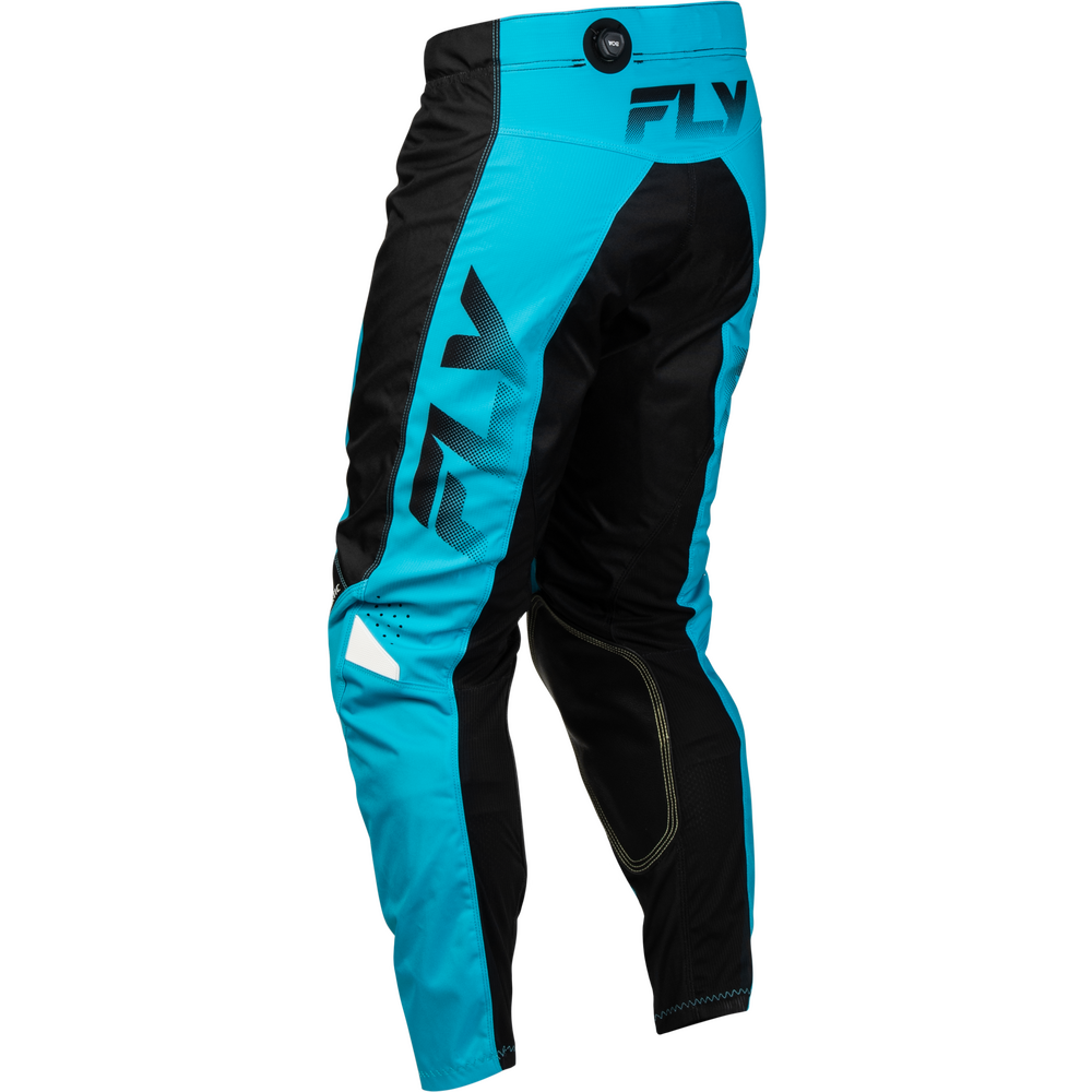 A pair of Fly motocross pants in a vibrant turquoise blue and black colorway, featuring large black 'FLY' logos on the side and a small white reflective patch near the lower leg, shown against a plain white background.