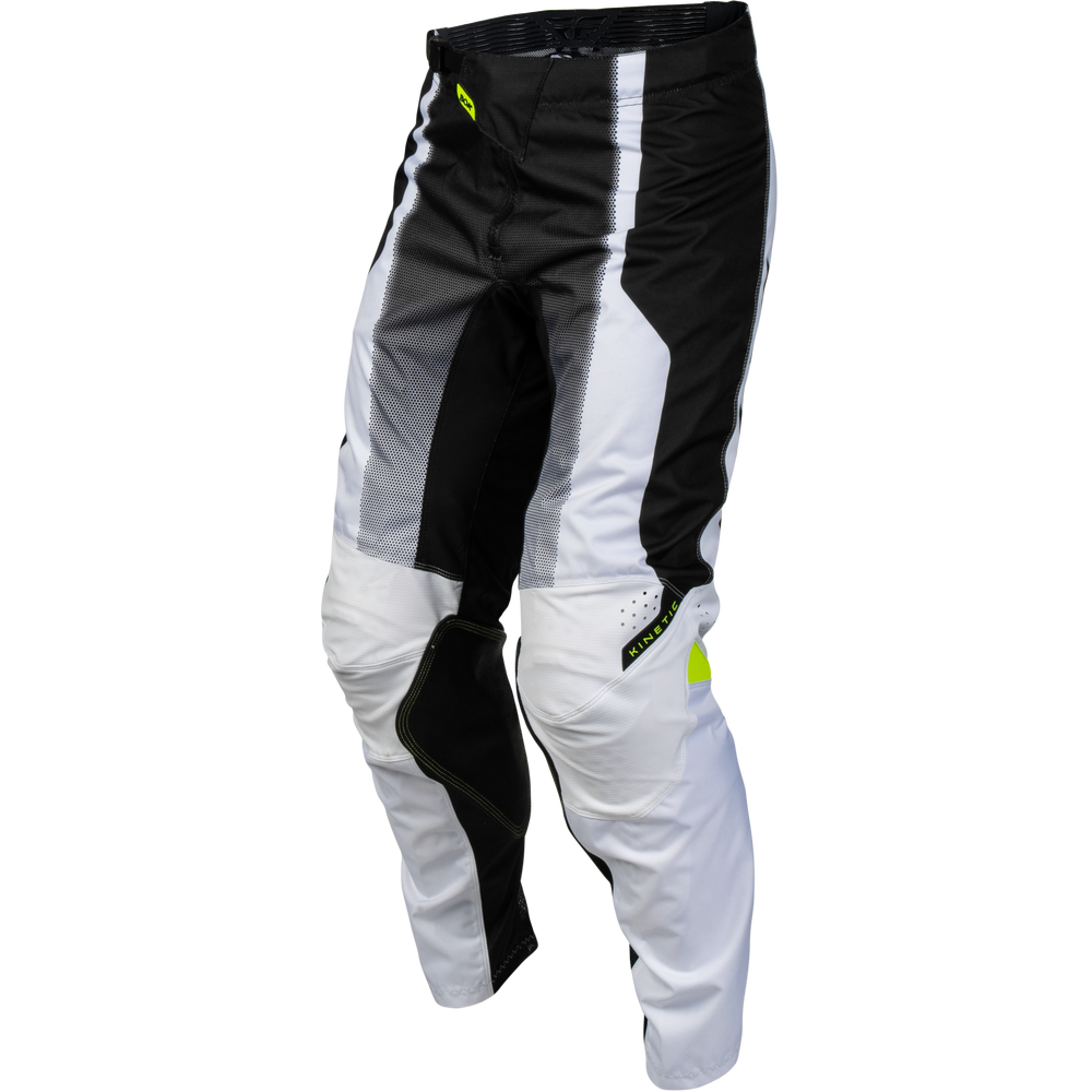 Black and white motocross pants with gray gradient panels and a small neon yellow-green logo, shown on a plain white background.
