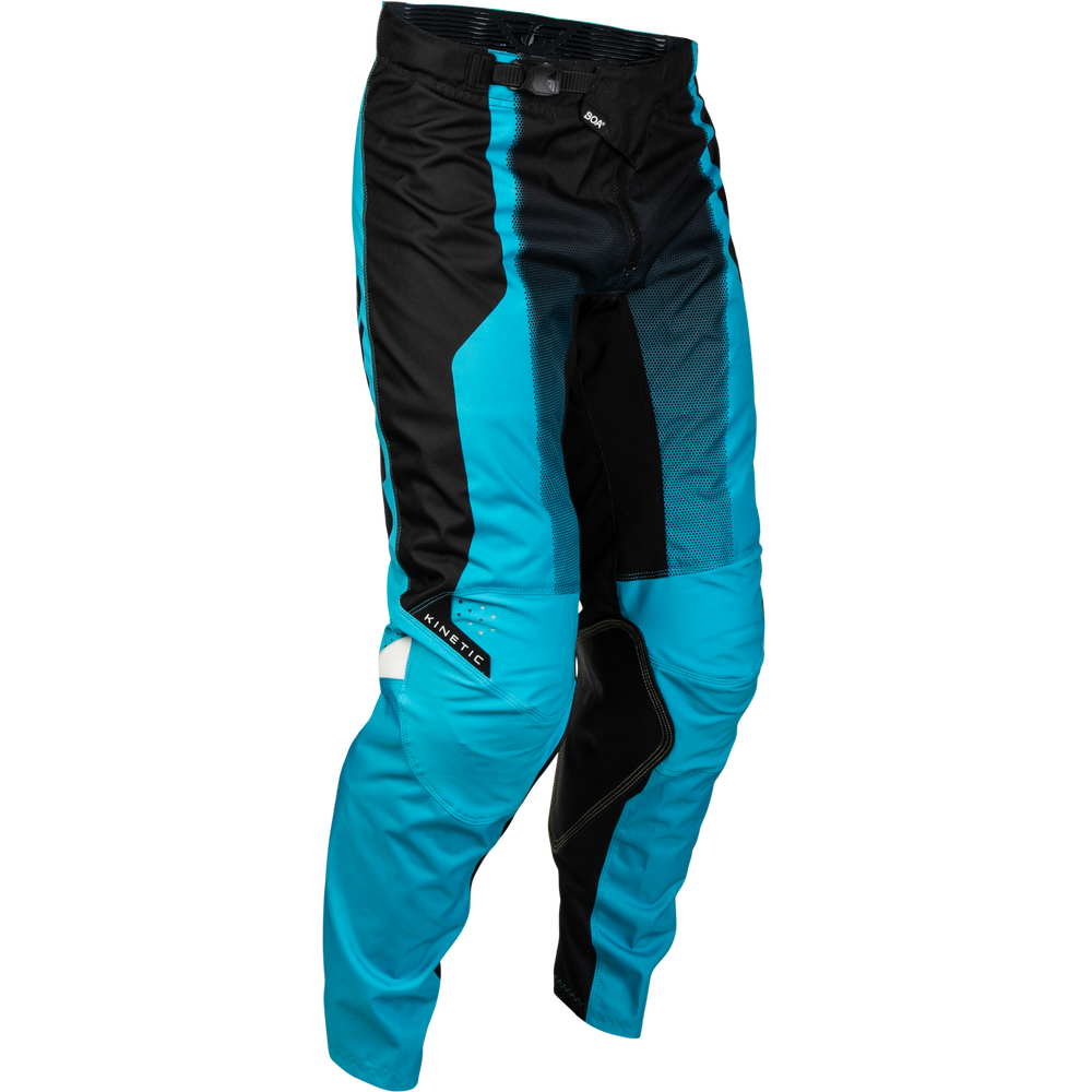 A pair of motocross pants in a vibrant turquoise blue and black colorway, featuring protective knee pads and a visible 'ALPHA TC' logo on the lower left leg, set against a plain white background.
