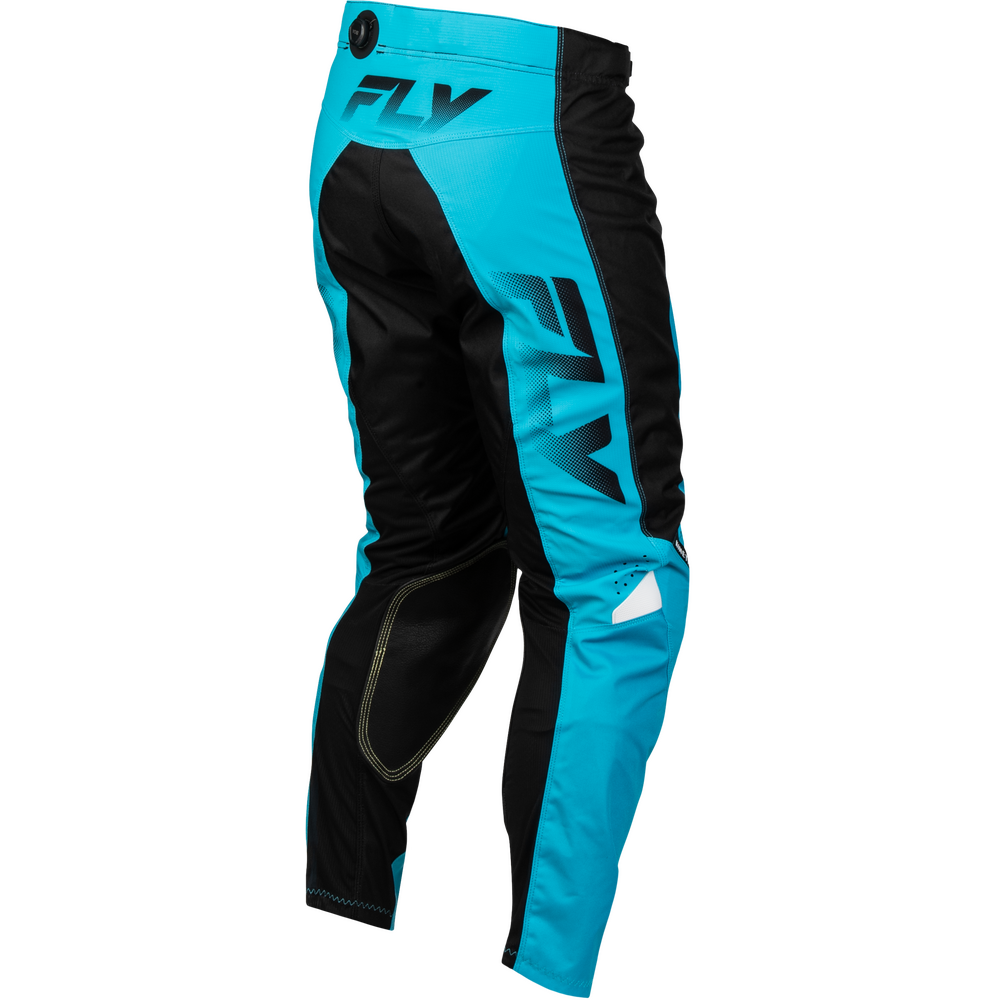 A pair of Fly motocross pants in a vibrant turquoise blue and black colorway, featuring large vertical 'FLY' logos on the side and a small white reflective patch near the lower leg.