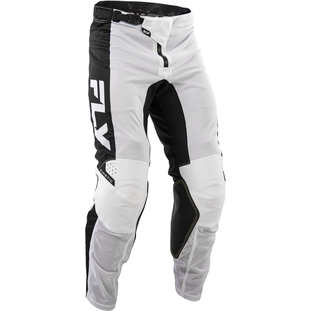 White and black Fly Racing motocross pants with protective knee and shin guards, shown on a clean white background.