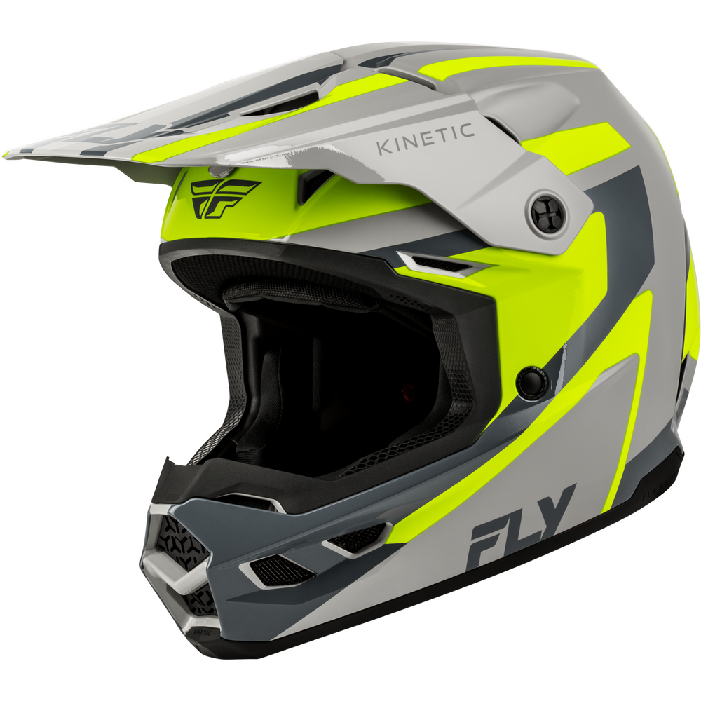 A full-face motocross helmet by Fly Kinetic, featuring a gray and neon yellow-green color scheme with black accents, shown on a solid white background.