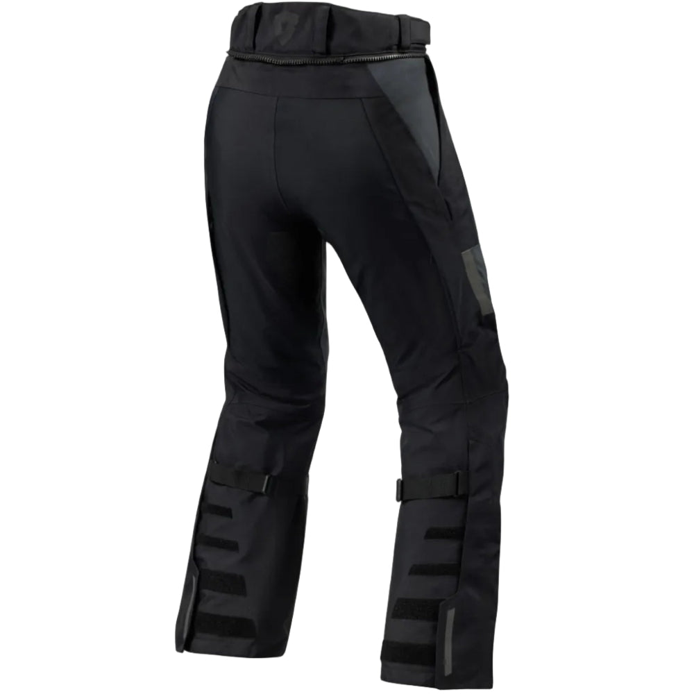Black tactical pants on a light gray background
