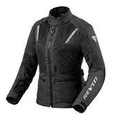 A black motorcycle jacket with reflective silver-gray panels and white 'REV'IT!' branding on the left sleeve, displayed on a light gray background.